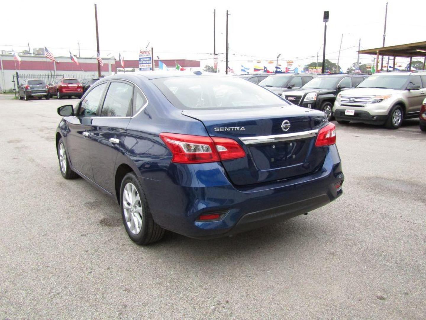 2019 BLUE NISSAN SENTRA S (3N1AB7AP4KL) with an 1.8L engine, Continuously Variable transmission, located at 830 E. Canino Rd., Houston, TX, 77037, (281) 405-0440, 38.358219, -81.729942 - Photo#2