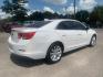 2015 WHITE CHEVROLET MALIBU 2LT (1G11D5SL3FF) with an 2.5L engine, Automatic transmission, located at 830 E. Canino Rd., Houston, TX, 77037, (281) 405-0440, 38.358219, -81.729942 - Photo#2