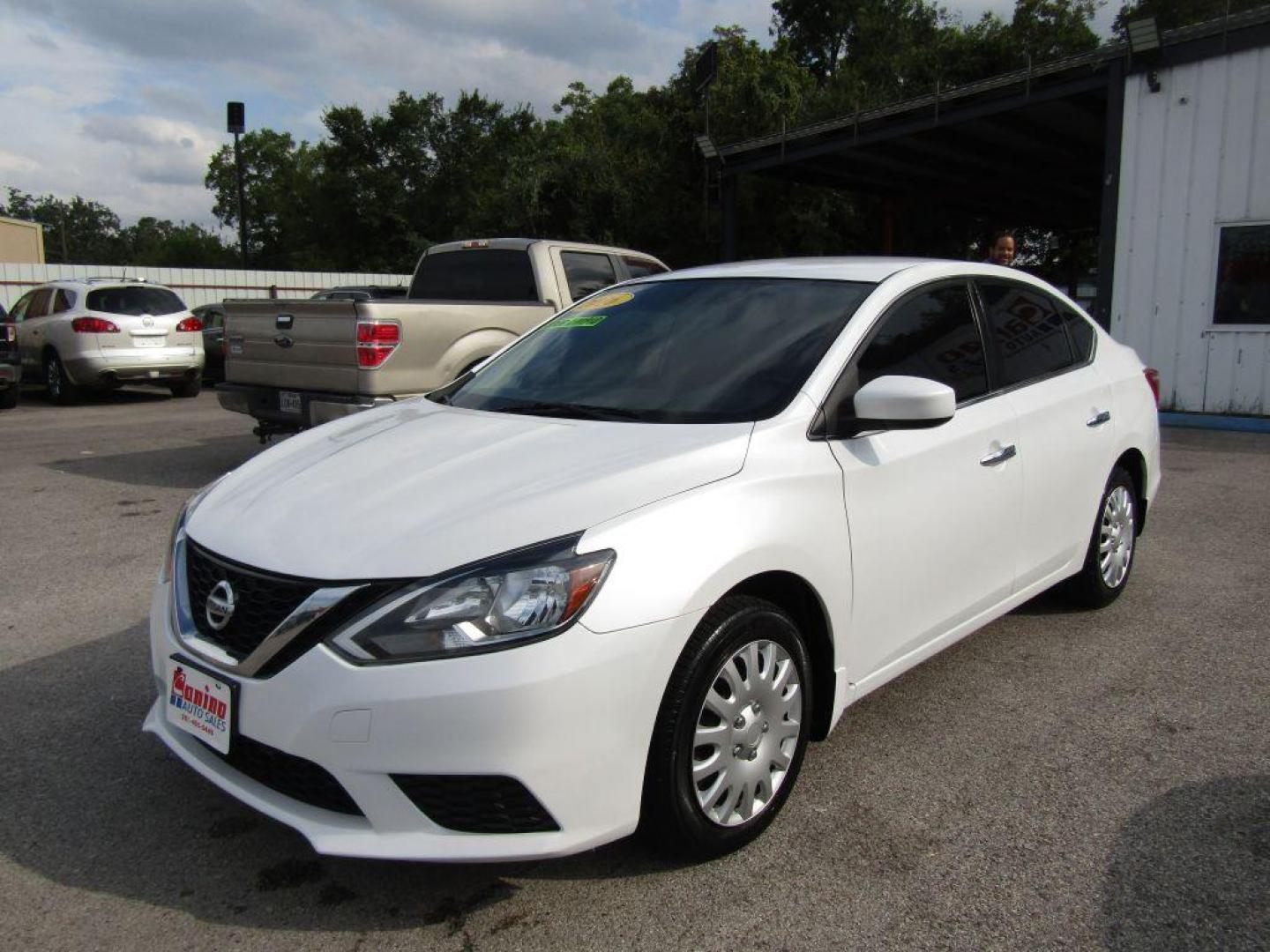 2016 WHITE NISSAN SENTRA S (3N1AB7APXGY) with an 1.8L engine, Continuously Variable transmission, located at 830 E. Canino Rd., Houston, TX, 77037, (281) 405-0440, 38.358219, -81.729942 - Photo#1