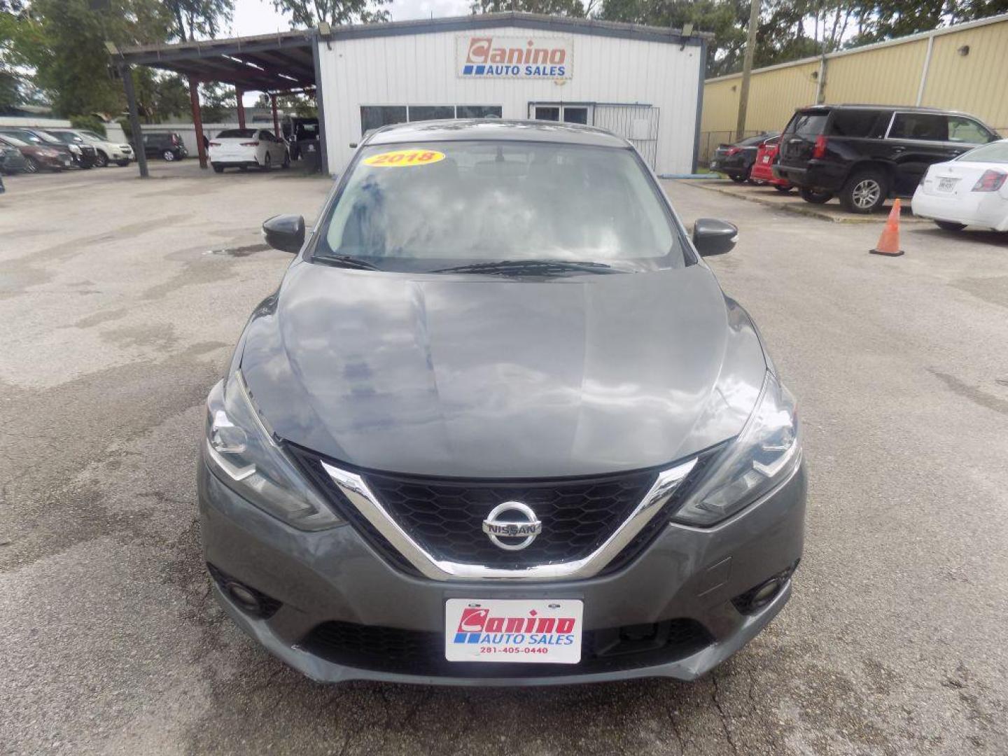 2018 GRAY NISSAN SENTRA S (3N1AB7AP7JY) with an 1.8L engine, Continuously Variable transmission, located at 830 E. Canino Rd., Houston, TX, 77037, (281) 405-0440, 38.358219, -81.729942 - PAGOS COMODOS, ENGANCHES COMODOS. FINANCIAMIENTO RAPIDO Y FACIL. BUEN CREDITO, MAL CREDITO, COMPRADOR POR PRIMERA VES O NO LICENCIA, CANINO AUTO SALES TE PUEDE AYUDAR! LLAMA/TEXTO O VISITANOS HOY MISMO (281) 405-0440 ESTAMOS LOCALIZADOS EN 830 E. CANINO RD. (ESQUINA CON AIRLINE) HOUSTON, TEXAS - Photo#0