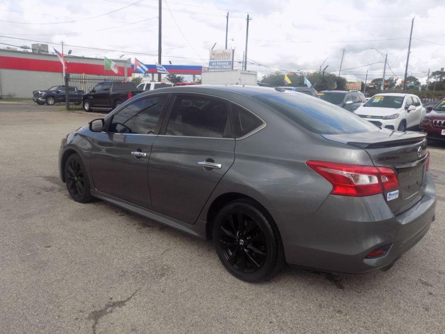 2018 GRAY NISSAN SENTRA S (3N1AB7AP7JY) with an 1.8L engine, Continuously Variable transmission, located at 830 E. Canino Rd., Houston, TX, 77037, (281) 405-0440, 38.358219, -81.729942 - PAGOS COMODOS, ENGANCHES COMODOS. FINANCIAMIENTO RAPIDO Y FACIL. BUEN CREDITO, MAL CREDITO, COMPRADOR POR PRIMERA VES O NO LICENCIA, CANINO AUTO SALES TE PUEDE AYUDAR! LLAMA/TEXTO O VISITANOS HOY MISMO (281) 405-0440 ESTAMOS LOCALIZADOS EN 830 E. CANINO RD. (ESQUINA CON AIRLINE) HOUSTON, TEXAS - Photo#4