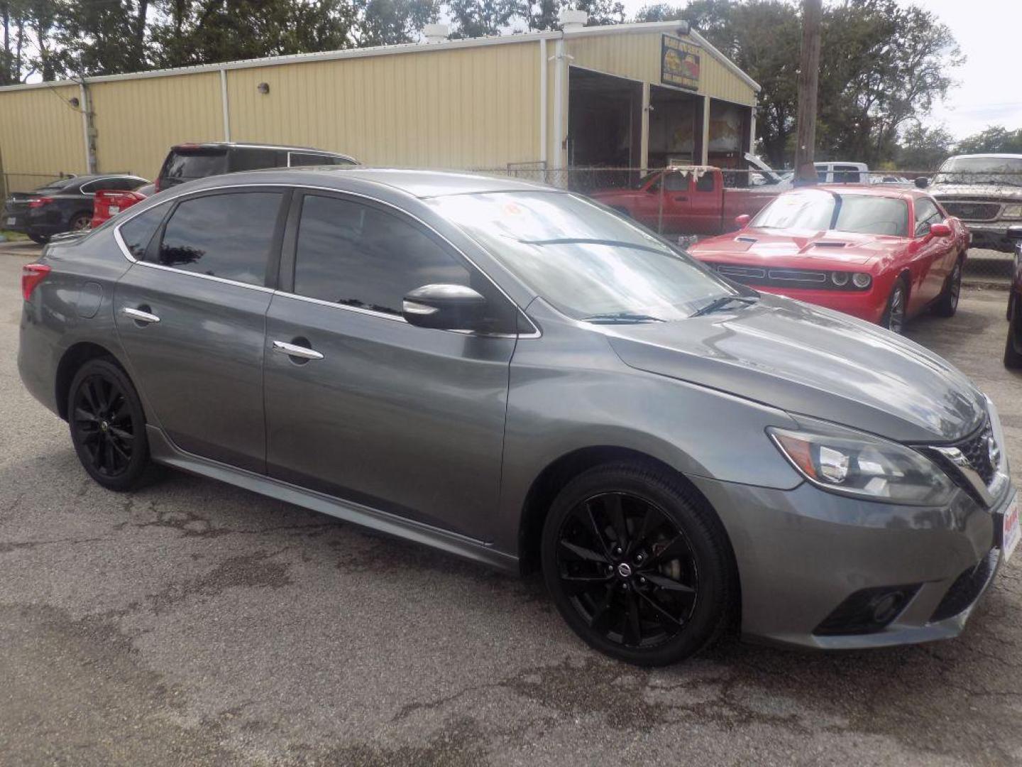 2018 GRAY NISSAN SENTRA S (3N1AB7AP7JY) with an 1.8L engine, Continuously Variable transmission, located at 830 E. Canino Rd., Houston, TX, 77037, (281) 405-0440, 38.358219, -81.729942 - PAGOS COMODOS, ENGANCHES COMODOS. FINANCIAMIENTO RAPIDO Y FACIL. BUEN CREDITO, MAL CREDITO, COMPRADOR POR PRIMERA VES O NO LICENCIA, CANINO AUTO SALES TE PUEDE AYUDAR! LLAMA/TEXTO O VISITANOS HOY MISMO (281) 405-0440 ESTAMOS LOCALIZADOS EN 830 E. CANINO RD. (ESQUINA CON AIRLINE) HOUSTON, TEXAS - Photo#6