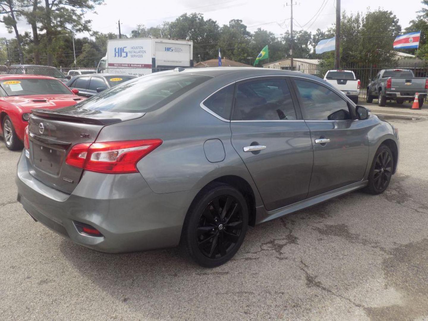 2018 GRAY NISSAN SENTRA S (3N1AB7AP7JY) with an 1.8L engine, Continuously Variable transmission, located at 830 E. Canino Rd., Houston, TX, 77037, (281) 405-0440, 38.358219, -81.729942 - PAGOS COMODOS, ENGANCHES COMODOS. FINANCIAMIENTO RAPIDO Y FACIL. BUEN CREDITO, MAL CREDITO, COMPRADOR POR PRIMERA VES O NO LICENCIA, CANINO AUTO SALES TE PUEDE AYUDAR! LLAMA/TEXTO O VISITANOS HOY MISMO (281) 405-0440 ESTAMOS LOCALIZADOS EN 830 E. CANINO RD. (ESQUINA CON AIRLINE) HOUSTON, TEXAS - Photo#7