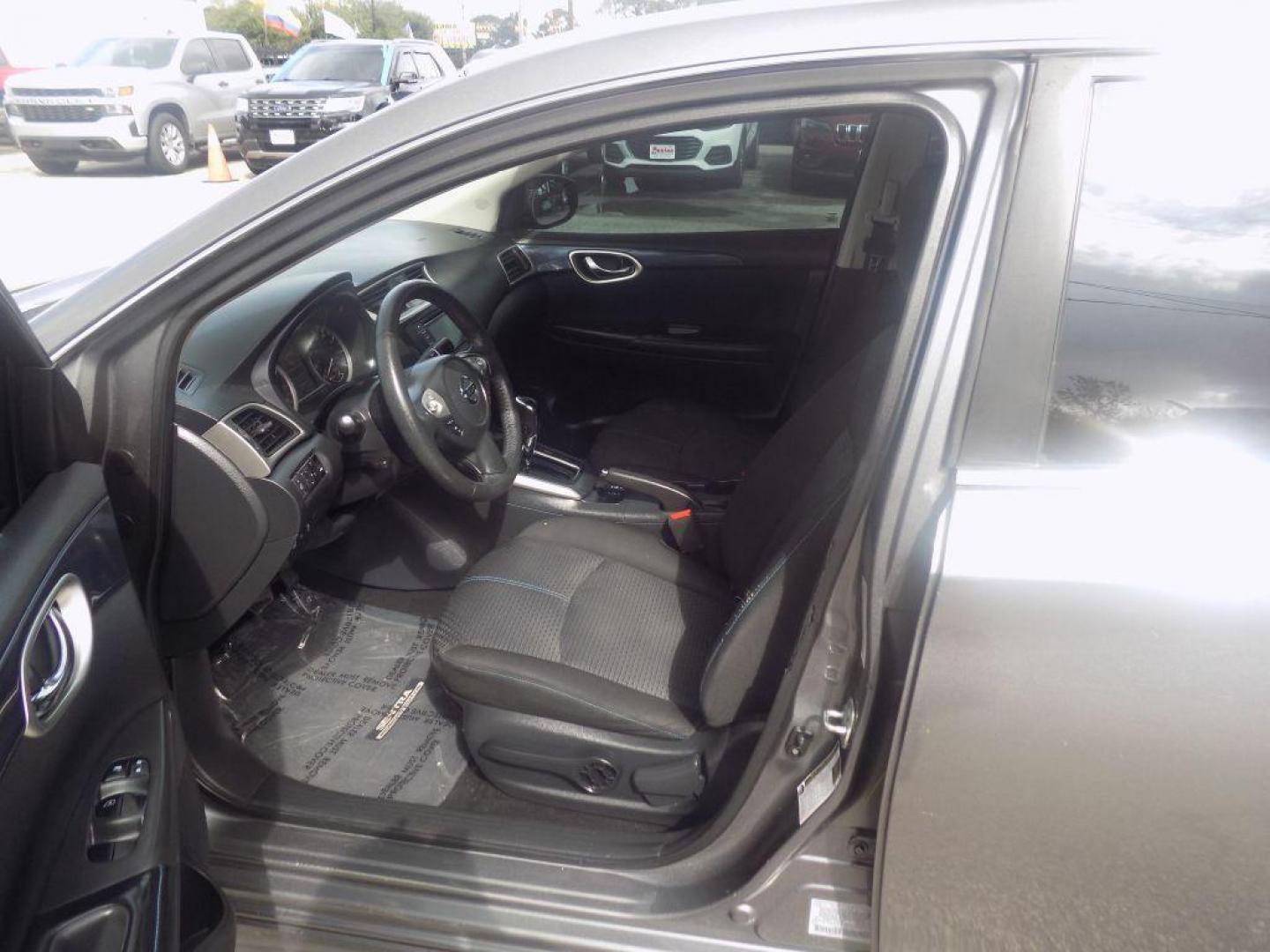 2018 GRAY NISSAN SENTRA S (3N1AB7AP7JY) with an 1.8L engine, Continuously Variable transmission, located at 830 E. Canino Rd., Houston, TX, 77037, (281) 405-0440, 38.358219, -81.729942 - PAGOS COMODOS, ENGANCHES COMODOS. FINANCIAMIENTO RAPIDO Y FACIL. BUEN CREDITO, MAL CREDITO, COMPRADOR POR PRIMERA VES O NO LICENCIA, CANINO AUTO SALES TE PUEDE AYUDAR! LLAMA/TEXTO O VISITANOS HOY MISMO (281) 405-0440 ESTAMOS LOCALIZADOS EN 830 E. CANINO RD. (ESQUINA CON AIRLINE) HOUSTON, TEXAS - Photo#16