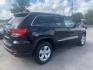 2012 BLACK JEEP GRAND CHEROKEE LAREDO (1C4RJFAG8CC) with an 3.6L engine, Automatic transmission, located at 830 E. Canino Rd., Houston, TX, 77037, (281) 405-0440, 38.358219, -81.729942 - Photo#4