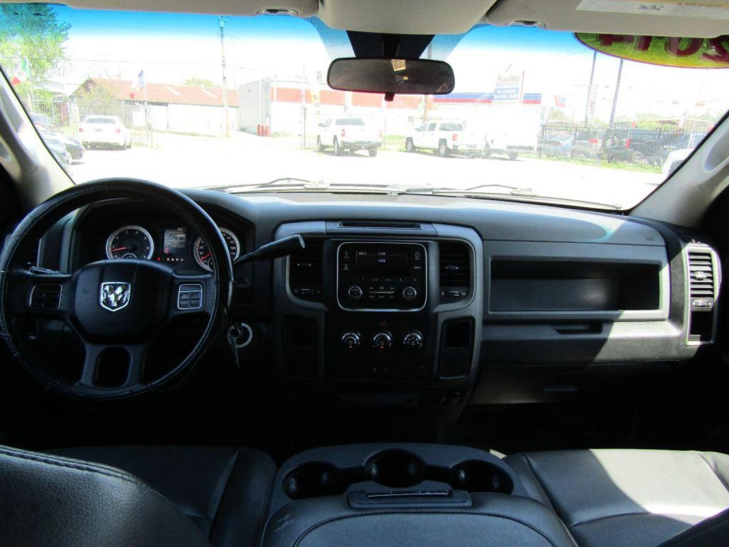 2014 BLACK RAM 1500 ST (1C6RR6FT9ES) with an 5.7L engine, Automatic transmission, located at 830 E. Canino Rd., Houston, TX, 77037, (281) 405-0440, 38.358219, -81.729942 - Photo#11