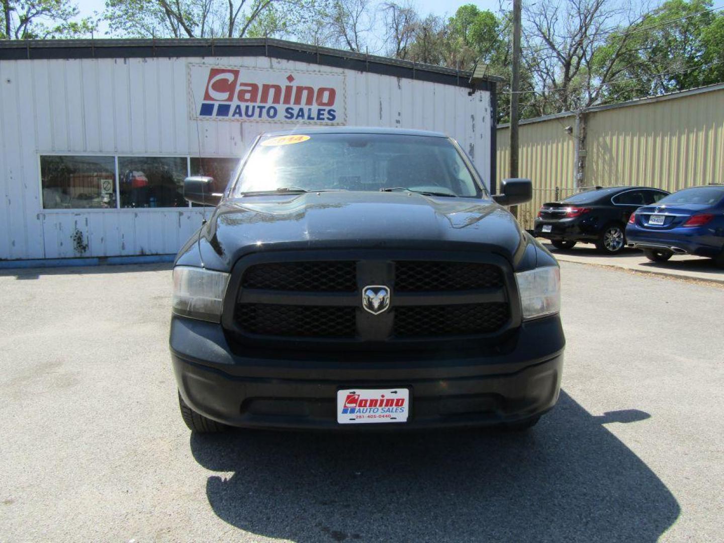 2014 BLACK RAM 1500 ST (1C6RR6FT9ES) with an 5.7L engine, Automatic transmission, located at 830 E. Canino Rd., Houston, TX, 77037, (281) 405-0440, 38.358219, -81.729942 - Photo#0