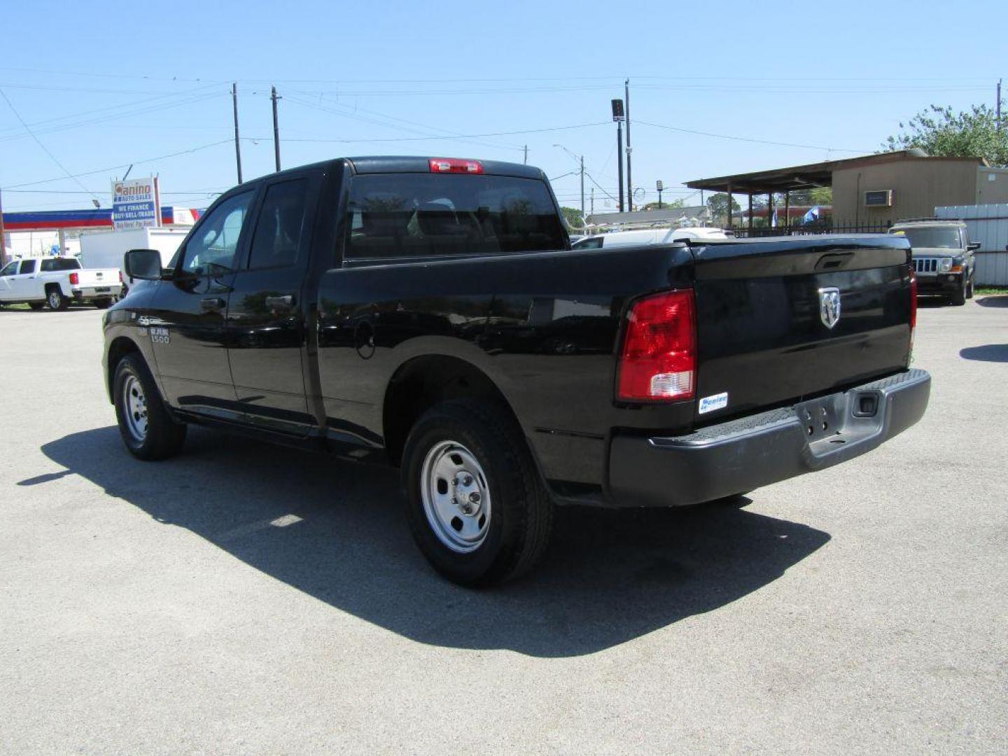 2014 BLACK RAM 1500 ST (1C6RR6FT9ES) with an 5.7L engine, Automatic transmission, located at 830 E. Canino Rd., Houston, TX, 77037, (281) 405-0440, 38.358219, -81.729942 - Photo#2