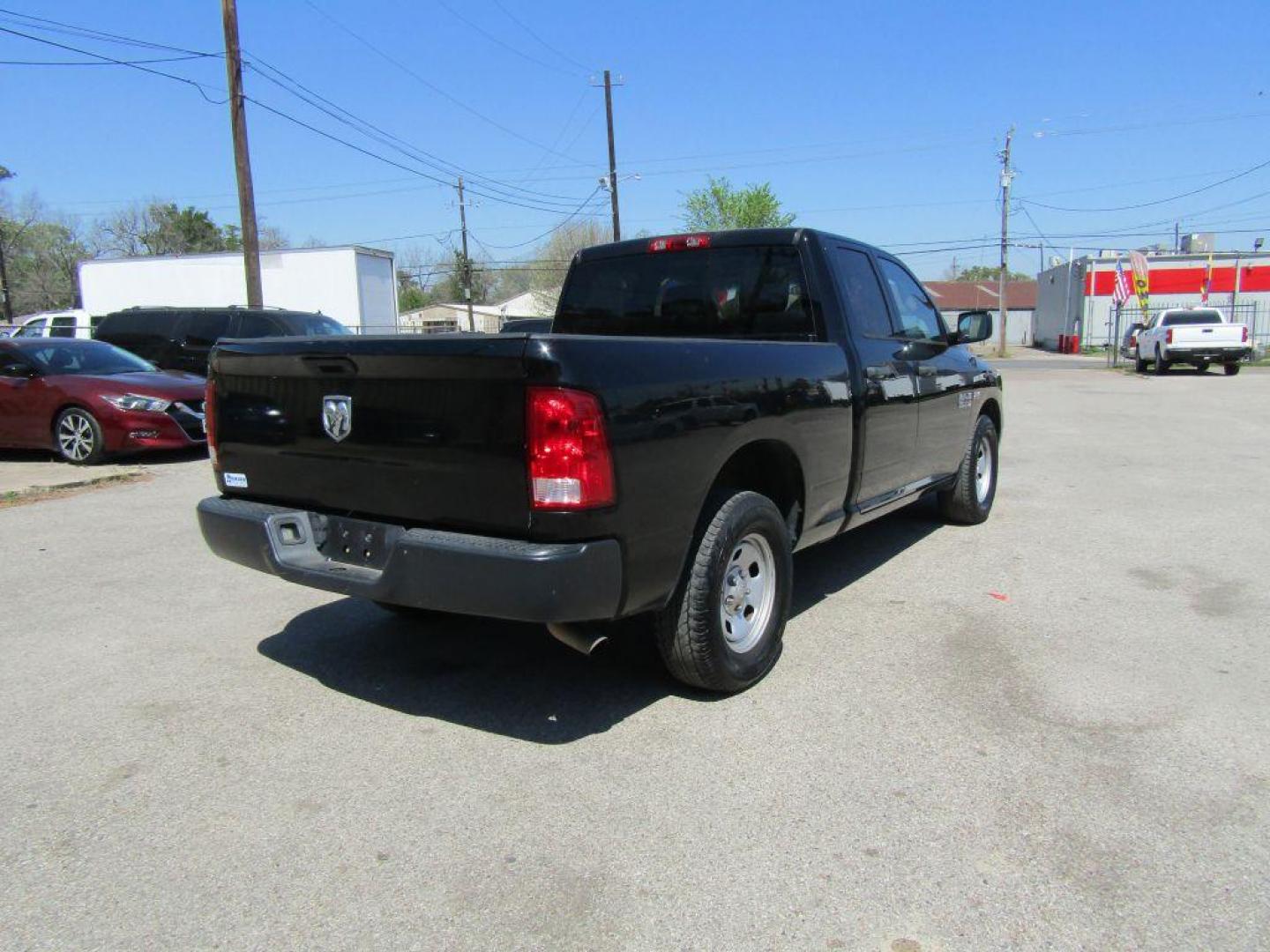 2014 BLACK RAM 1500 ST (1C6RR6FT9ES) with an 5.7L engine, Automatic transmission, located at 830 E. Canino Rd., Houston, TX, 77037, (281) 405-0440, 38.358219, -81.729942 - Photo#4