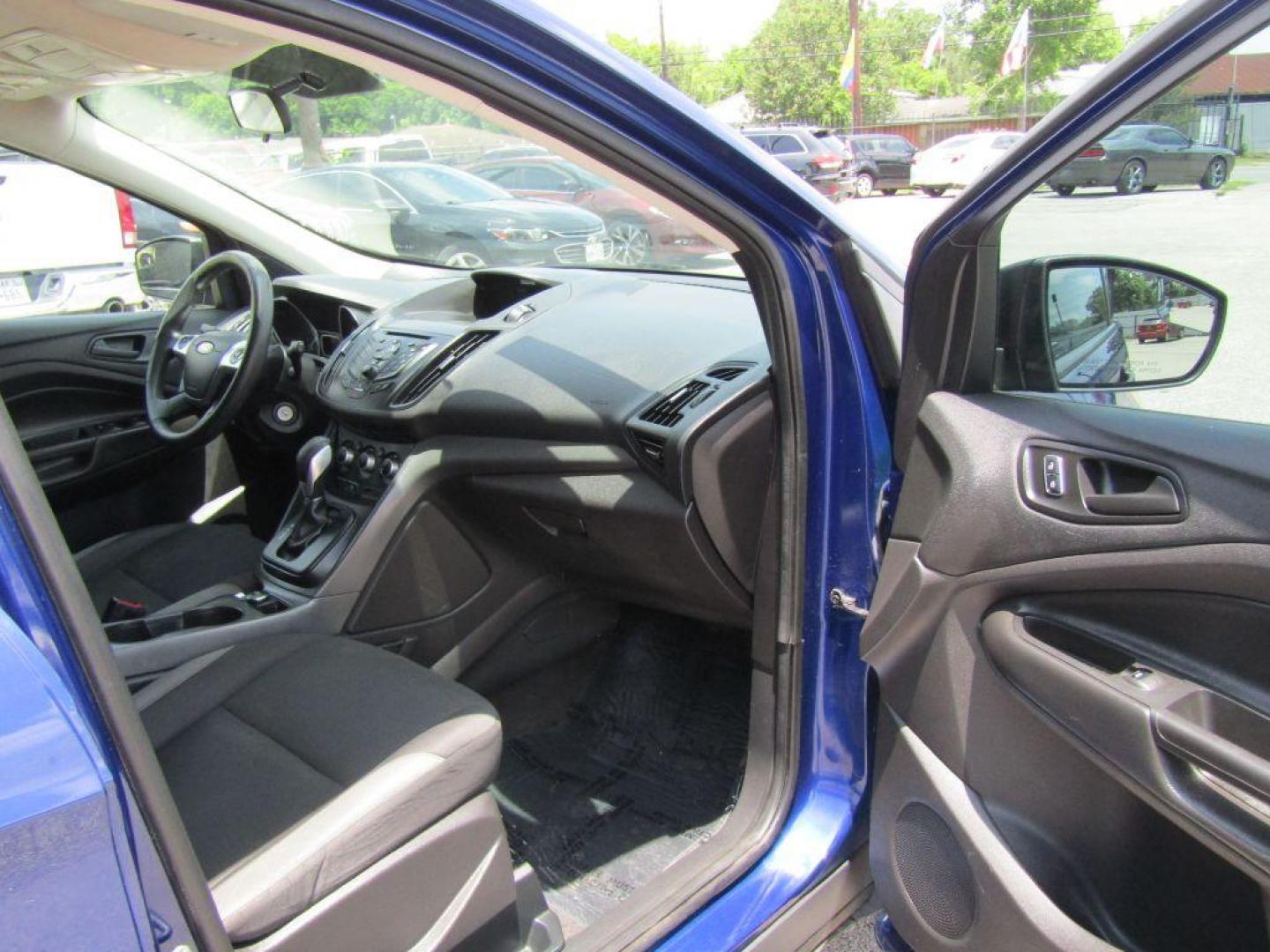 2015 BLUE FORD ESCAPE S (1FMCU0F71FU) with an 2.5L engine, Automatic transmission, located at 830 E. Canino Rd., Houston, TX, 77037, (281) 405-0440, 38.358219, -81.729942 - $1,500 DOWN + TT and L IN HOUSE FINANCING AVAILABLE FINANCIAMIENTO EN CASA DISPONIBLE CALL OR COME IN TODAY 281 405 0440 CANINO AUTO SALES, LLC - Photo#4