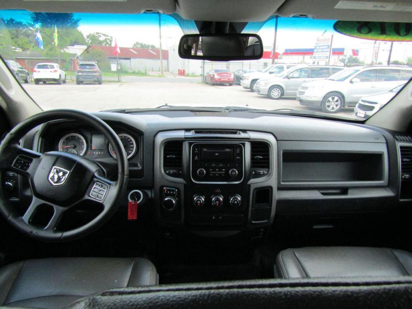 2018 WHITE RAM 1500 ST (1C6RR6FG7JS) with an 3.6L engine, Automatic transmission, located at 830 E. Canino Rd., Houston, TX, 77037, (281) 405-0440, 38.358219, -81.729942 - Photo#11