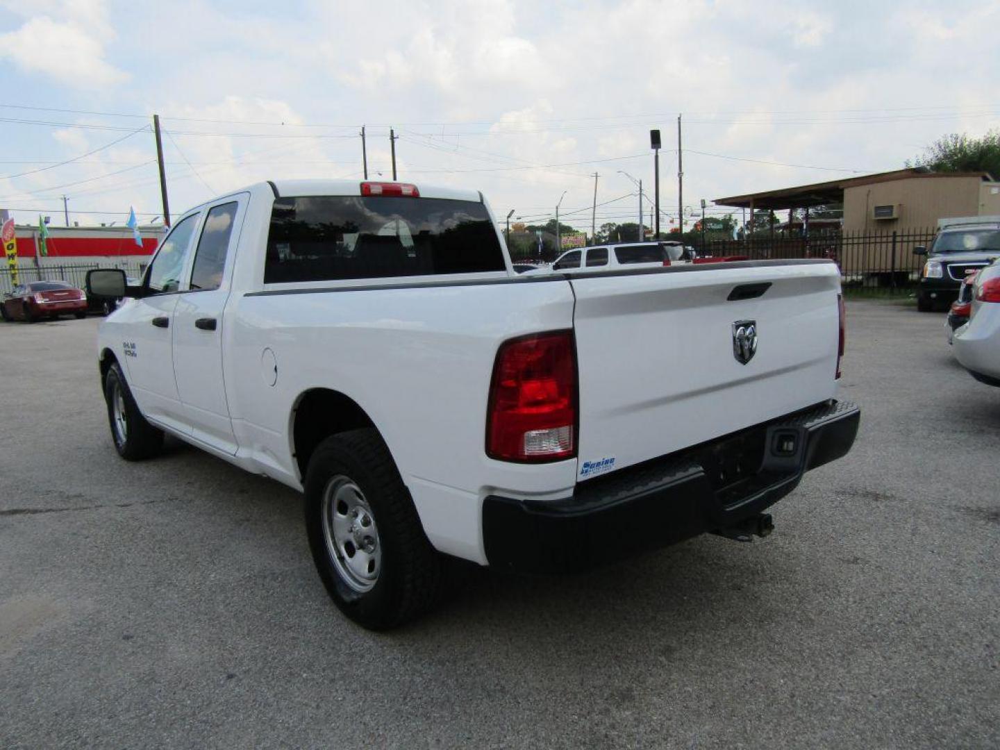 2018 WHITE RAM 1500 ST (1C6RR6FG7JS) with an 3.6L engine, Automatic transmission, located at 830 E. Canino Rd., Houston, TX, 77037, (281) 405-0440, 38.358219, -81.729942 - Photo#2