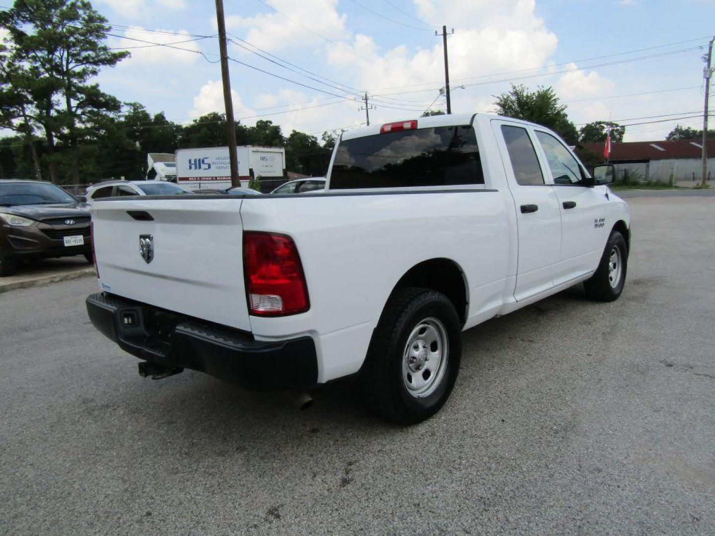 2018 WHITE RAM 1500 ST (1C6RR6FG7JS) with an 3.6L engine, Automatic transmission, located at 830 E. Canino Rd., Houston, TX, 77037, (281) 405-0440, 38.358219, -81.729942 - Photo#4