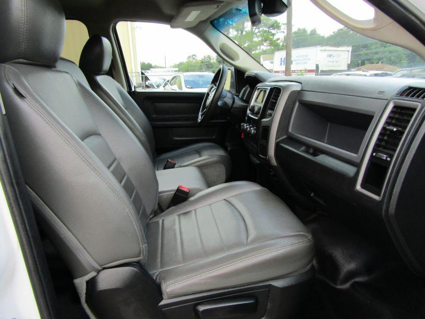 2018 WHITE RAM 1500 ST (1C6RR6FG7JS) with an 3.6L engine, Automatic transmission, located at 830 E. Canino Rd., Houston, TX, 77037, (281) 405-0440, 38.358219, -81.729942 - Photo#6