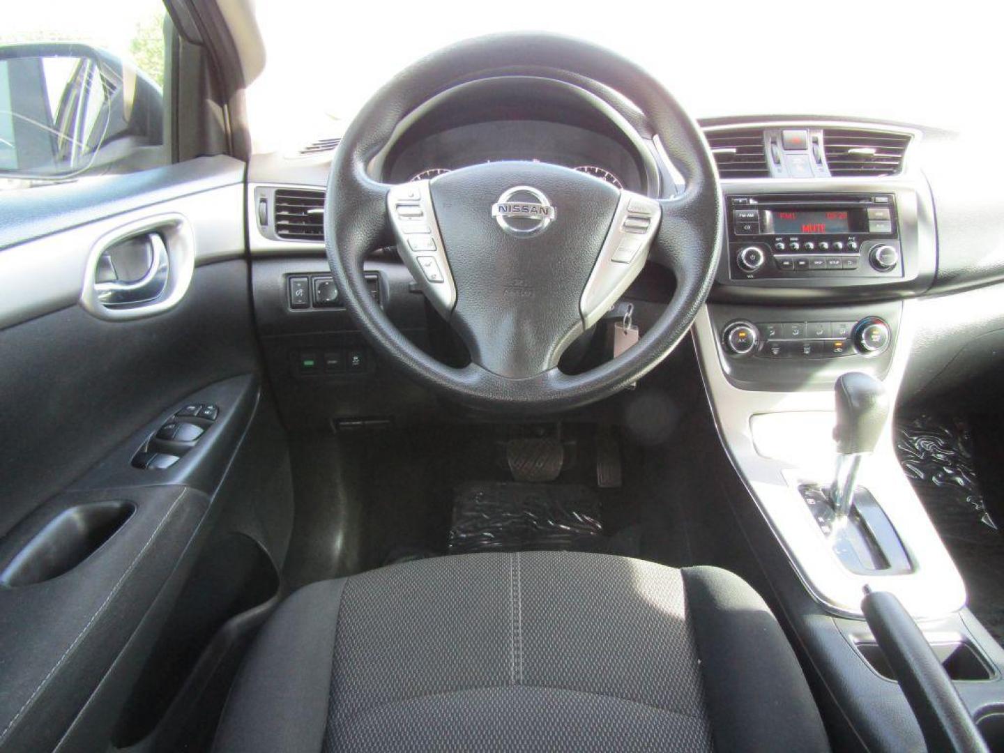 2015 GRAY NISSAN SENTRA S (3N1AB7AP5FY) with an 1.8L engine, Continuously Variable transmission, located at 830 E. Canino Rd., Houston, TX, 77037, (281) 405-0440, 38.358219, -81.729942 - Photo#9