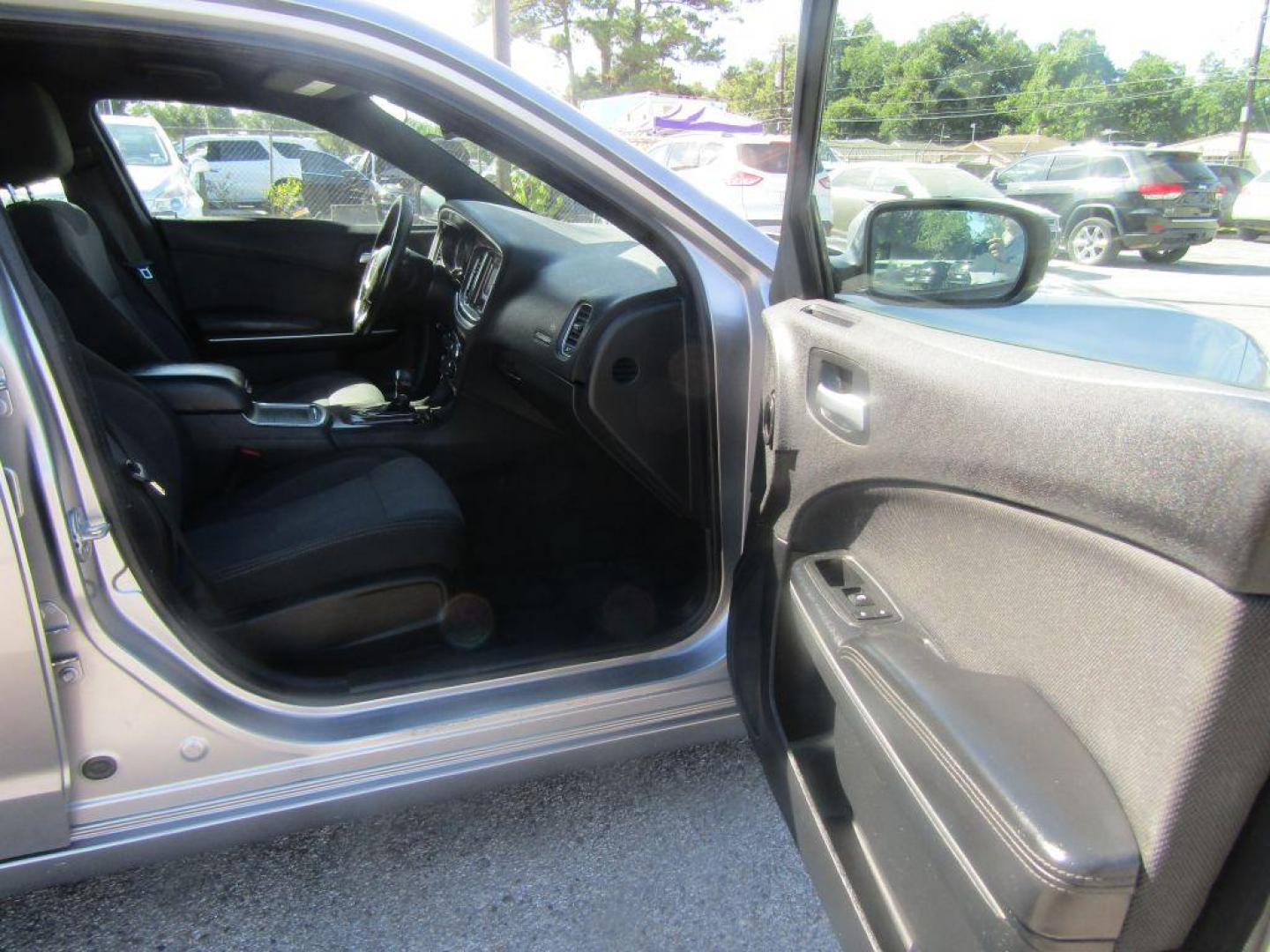 2015 SILVER DODGE CHARGER SE (2C3CDXBG3FH) with an 3.6L engine, Automatic transmission, located at 830 E. Canino Rd., Houston, TX, 77037, (281) 405-0440, 38.358219, -81.729942 - Photo#14