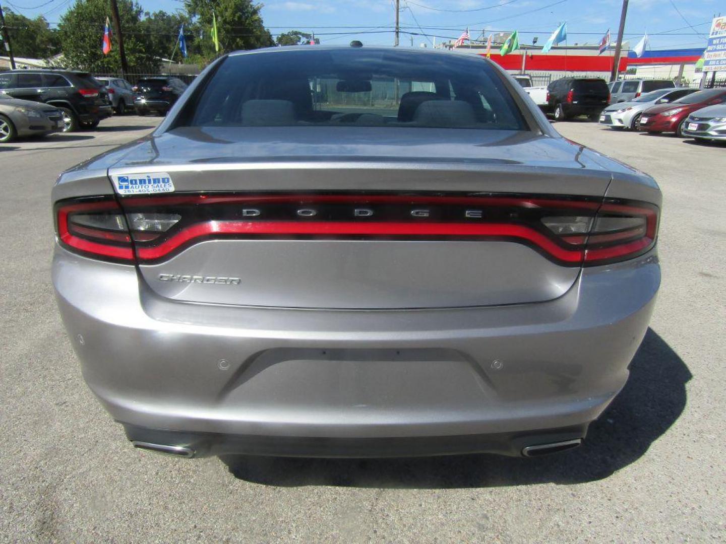 2015 SILVER DODGE CHARGER SE (2C3CDXBG3FH) with an 3.6L engine, Automatic transmission, located at 830 E. Canino Rd., Houston, TX, 77037, (281) 405-0440, 38.358219, -81.729942 - Photo#3