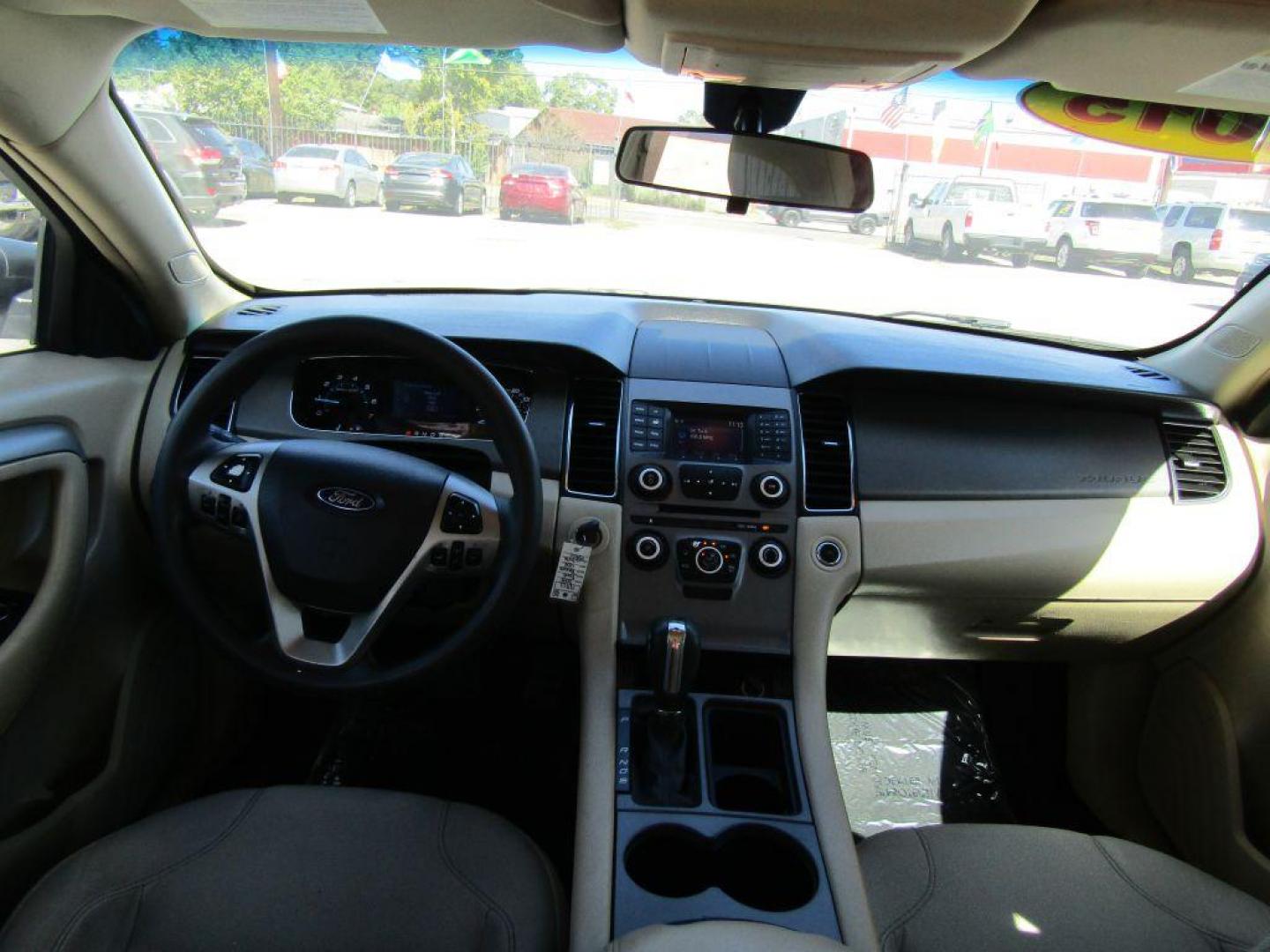 2015 WHITE FORD TAURUS SE (1FAHP2D89FG) with an 3.5L engine, Automatic transmission, located at 830 E. Canino Rd., Houston, TX, 77037, (281) 405-0440, 38.358219, -81.729942 - Photo#6