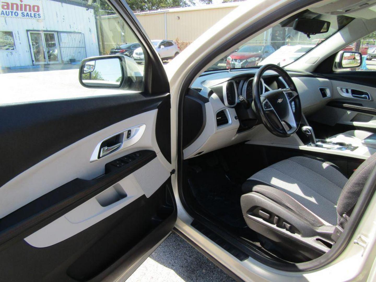 2014 TAN CHEVROLET EQUINOX LT (2GNALBEK1E6) with an 2.4L engine, Automatic transmission, located at 830 E. Canino Rd., Houston, TX, 77037, (281) 405-0440, 38.358219, -81.729942 - Photo#13