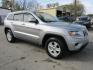 2014 SILVER JEEP GRAND CHEROKEE LAREDO (1C4RJEAG7EC) with an 3.6L engine, Automatic transmission, located at 830 E. Canino Rd., Houston, TX, 77037, (281) 405-0440, 38.358219, -81.729942 - Photo#15