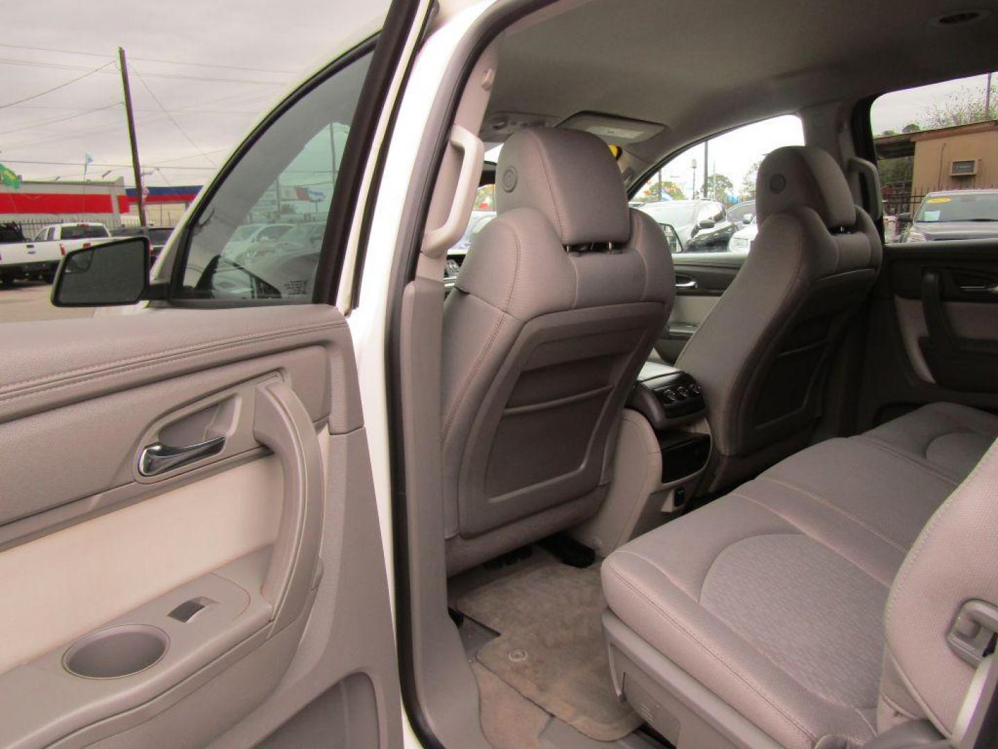 2014 WHITE GMC ACADIA SLE (1GKKRNED1EJ) with an 3.6L engine, Automatic transmission, located at 830 E. Canino Rd., Houston, TX, 77037, (281) 405-0440, 38.358219, -81.729942 - Photo#10