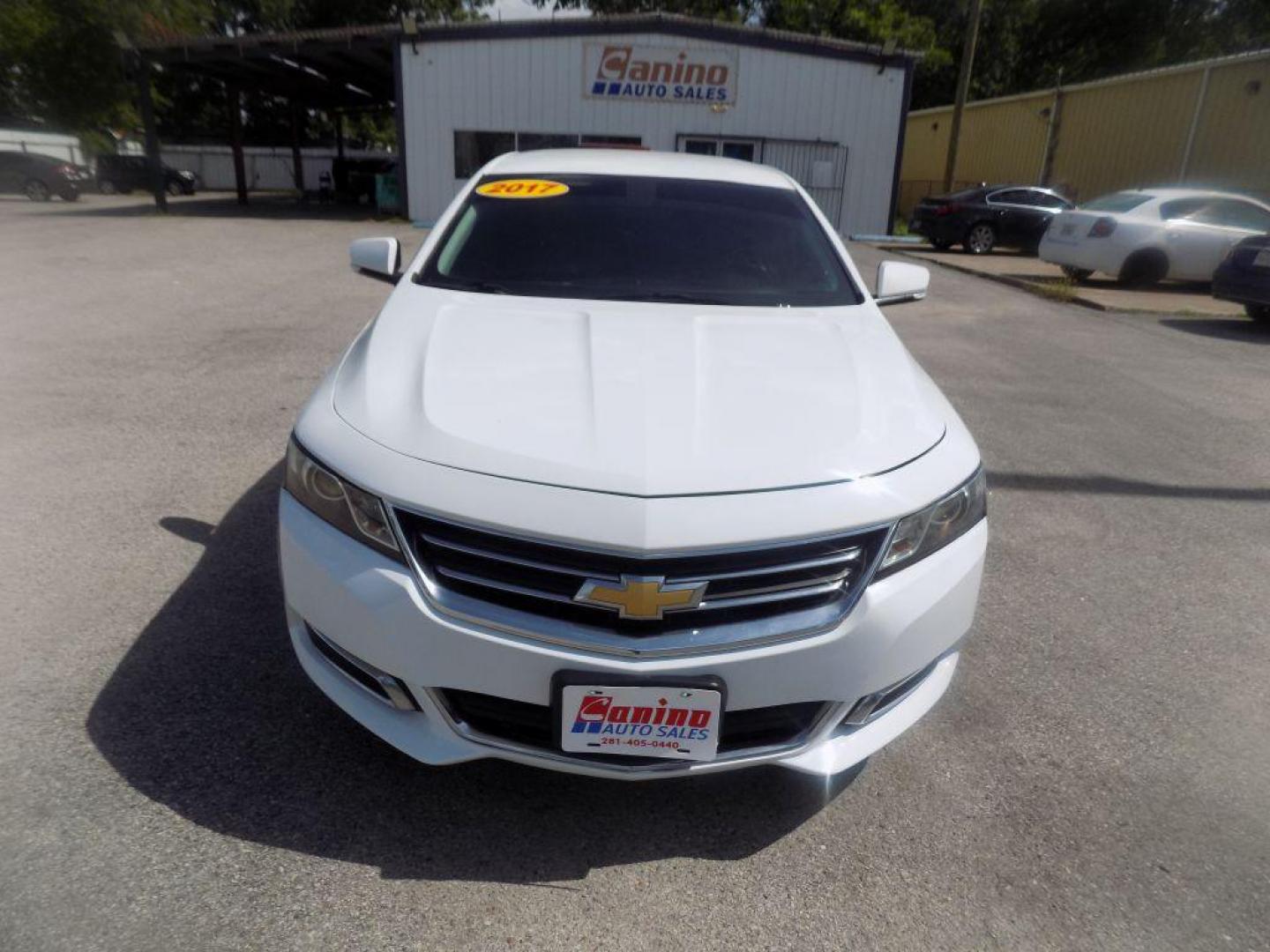 2017 WHITE CHEVROLET IMPALA LT (1G1105S39HU) with an 3.6L engine, Automatic transmission, located at 830 E. Canino Rd., Houston, TX, 77037, (281) 405-0440, 38.358219, -81.729942 - Photo#0