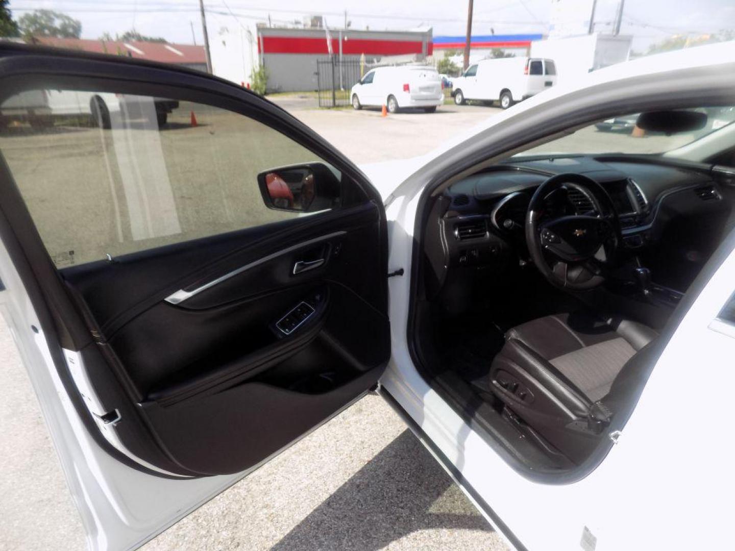 2017 WHITE CHEVROLET IMPALA LT (1G1105S39HU) with an 3.6L engine, Automatic transmission, located at 830 E. Canino Rd., Houston, TX, 77037, (281) 405-0440, 38.358219, -81.729942 - Photo#15