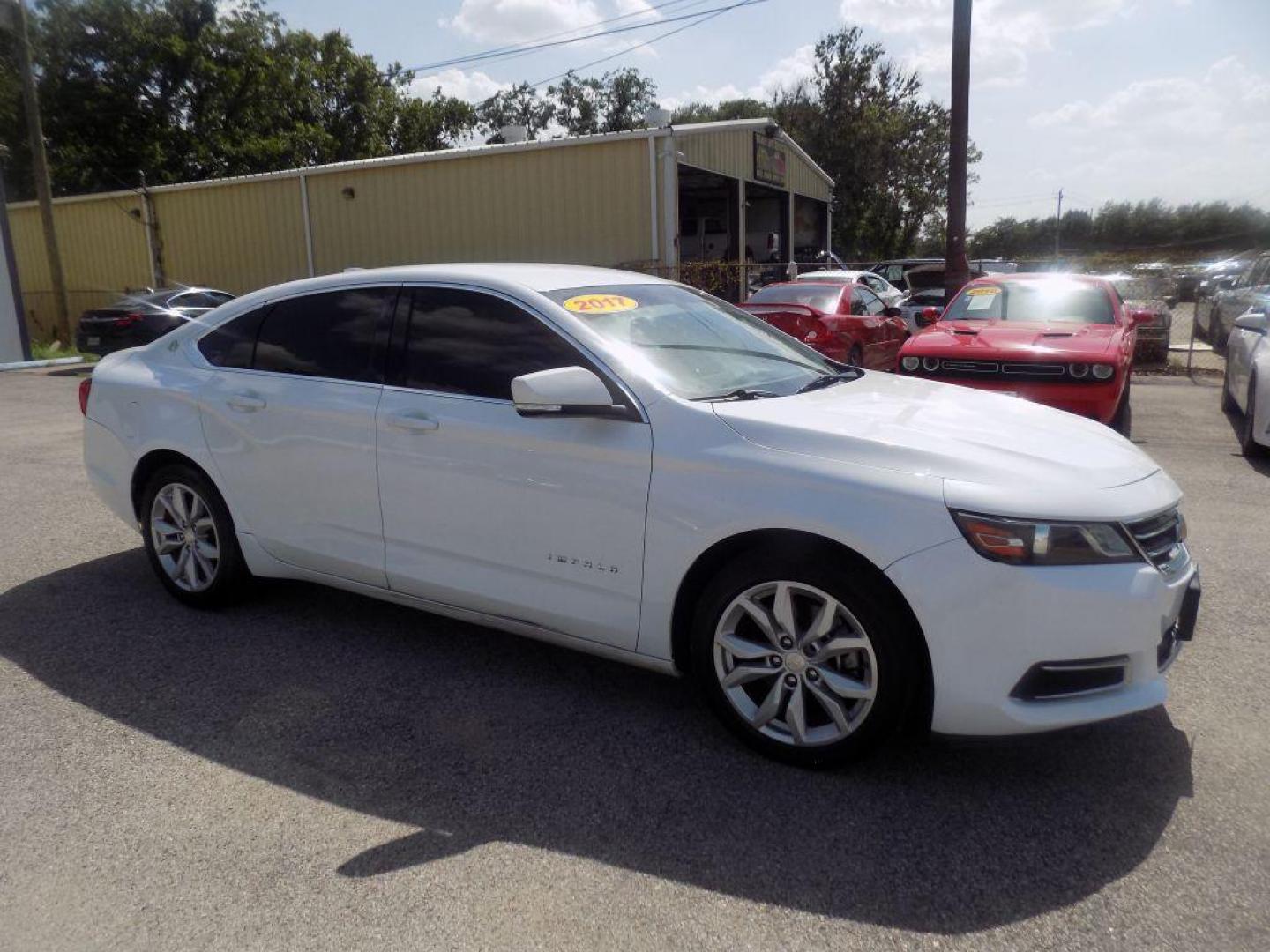 2017 WHITE CHEVROLET IMPALA LT (1G1105S39HU) with an 3.6L engine, Automatic transmission, located at 830 E. Canino Rd., Houston, TX, 77037, (281) 405-0440, 38.358219, -81.729942 - Photo#6