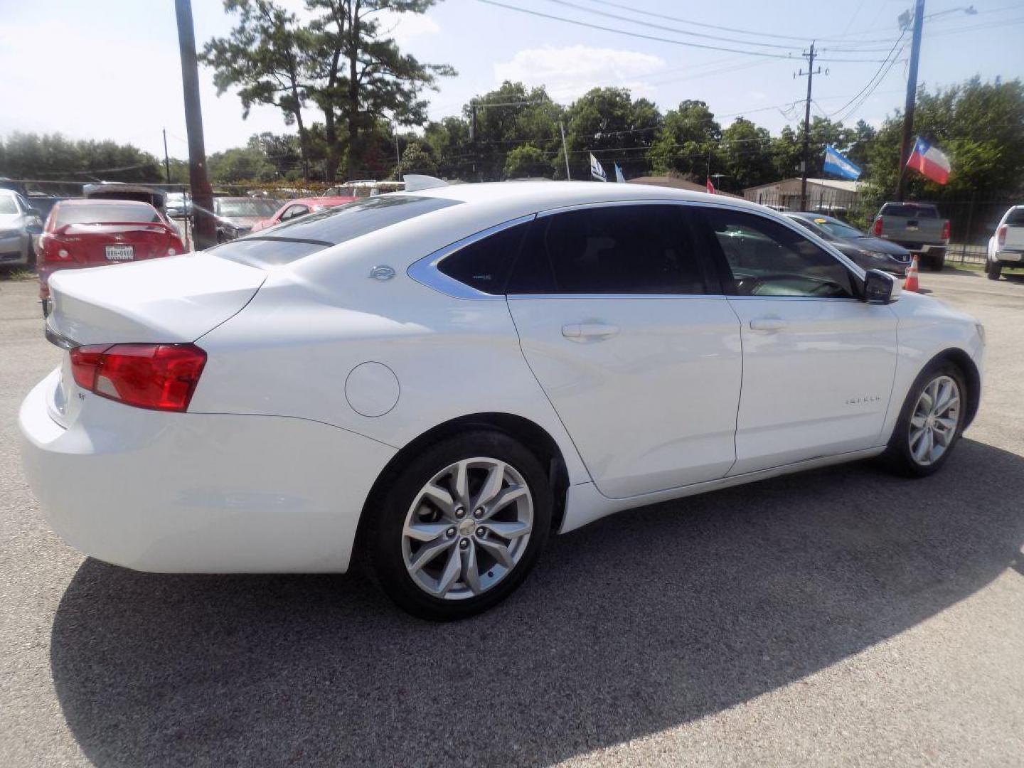 2017 WHITE CHEVROLET IMPALA LT (1G1105S39HU) with an 3.6L engine, Automatic transmission, located at 830 E. Canino Rd., Houston, TX, 77037, (281) 405-0440, 38.358219, -81.729942 - Photo#7