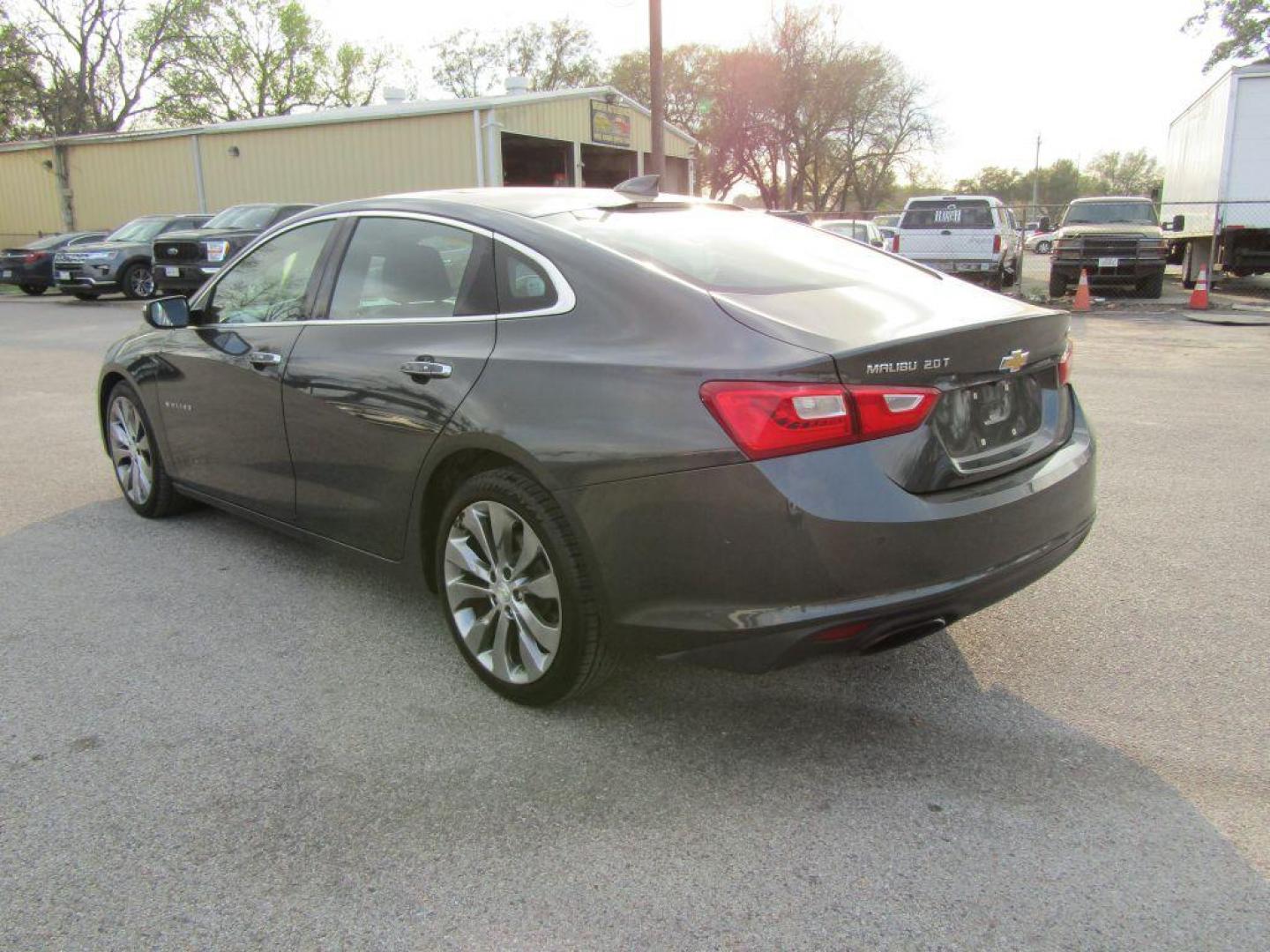 2016 GRAY CHEVROLET MALIBU PREMIER (1G1ZH5SXXGF) with an 2.0L engine, Automatic transmission, located at 830 E. Canino Rd., Houston, TX, 77037, (281) 405-0440, 38.358219, -81.729942 - Photo#2