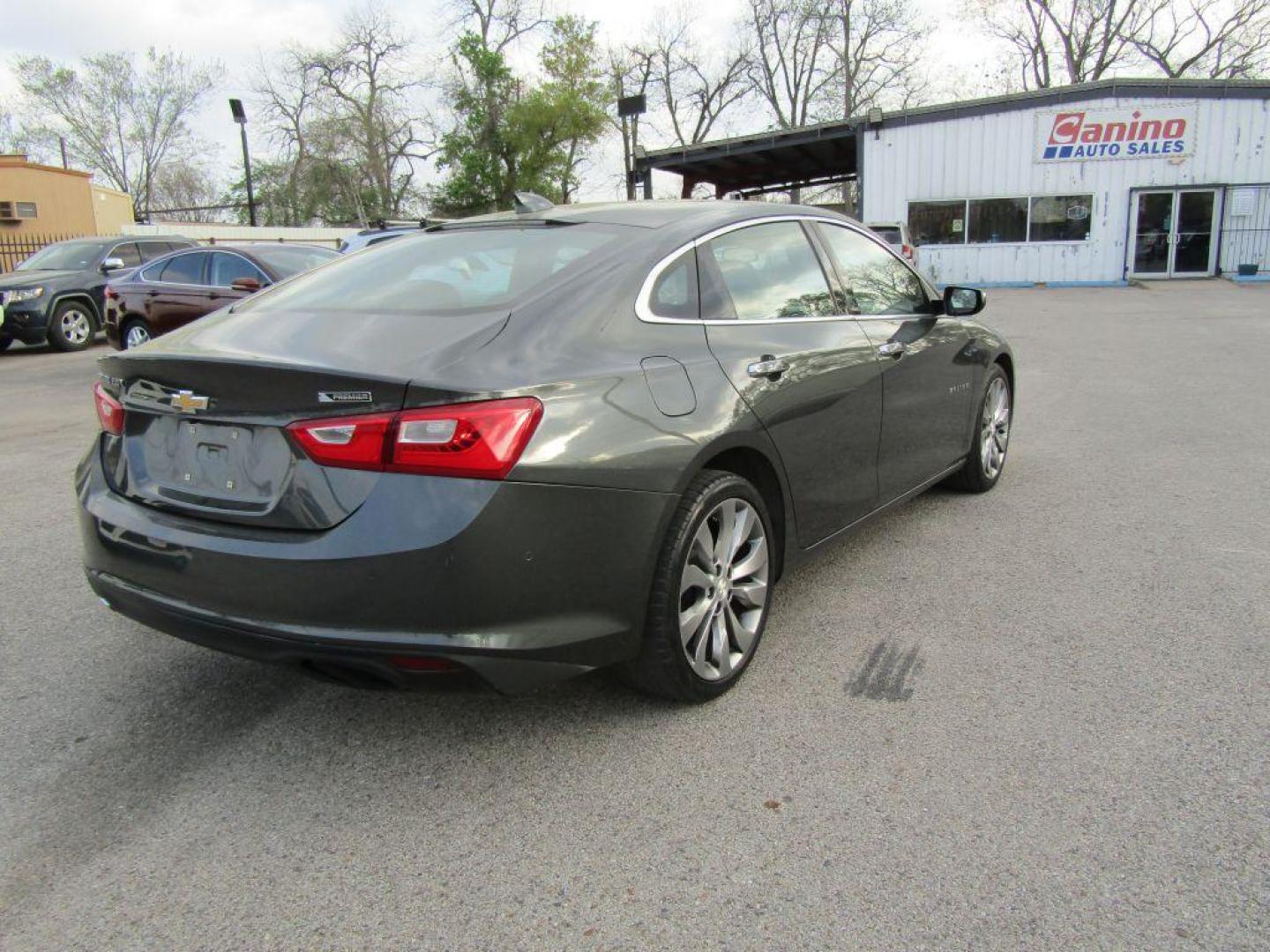 2016 GRAY CHEVROLET MALIBU PREMIER (1G1ZH5SXXGF) with an 2.0L engine, Automatic transmission, located at 830 E. Canino Rd., Houston, TX, 77037, (281) 405-0440, 38.358219, -81.729942 - Photo#4