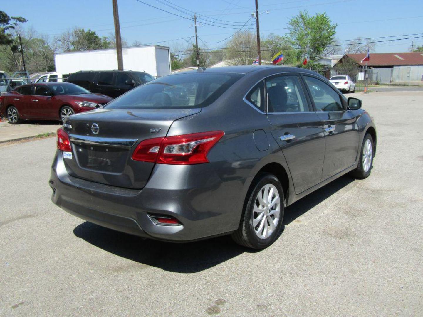 2018 GRAY NISSAN SENTRA S (3N1AB7AP5JL) with an 1.8L engine, Continuously Variable transmission, located at 830 E. Canino Rd., Houston, TX, 77037, (281) 405-0440, 38.358219, -81.729942 - Photo#4