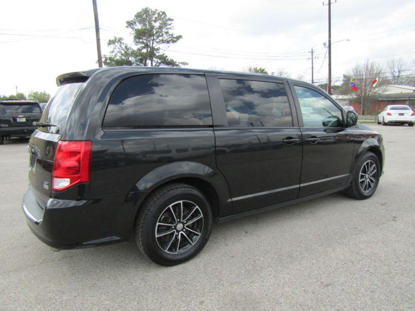 2018 BLACK DODGE GRAND CARAVAN GT (2C4RDGEGXJR) with an 3.6L engine, Automatic transmission, located at 830 E. Canino Rd., Houston, TX, 77037, (281) 405-0440, 38.358219, -81.729942 - Photo#2