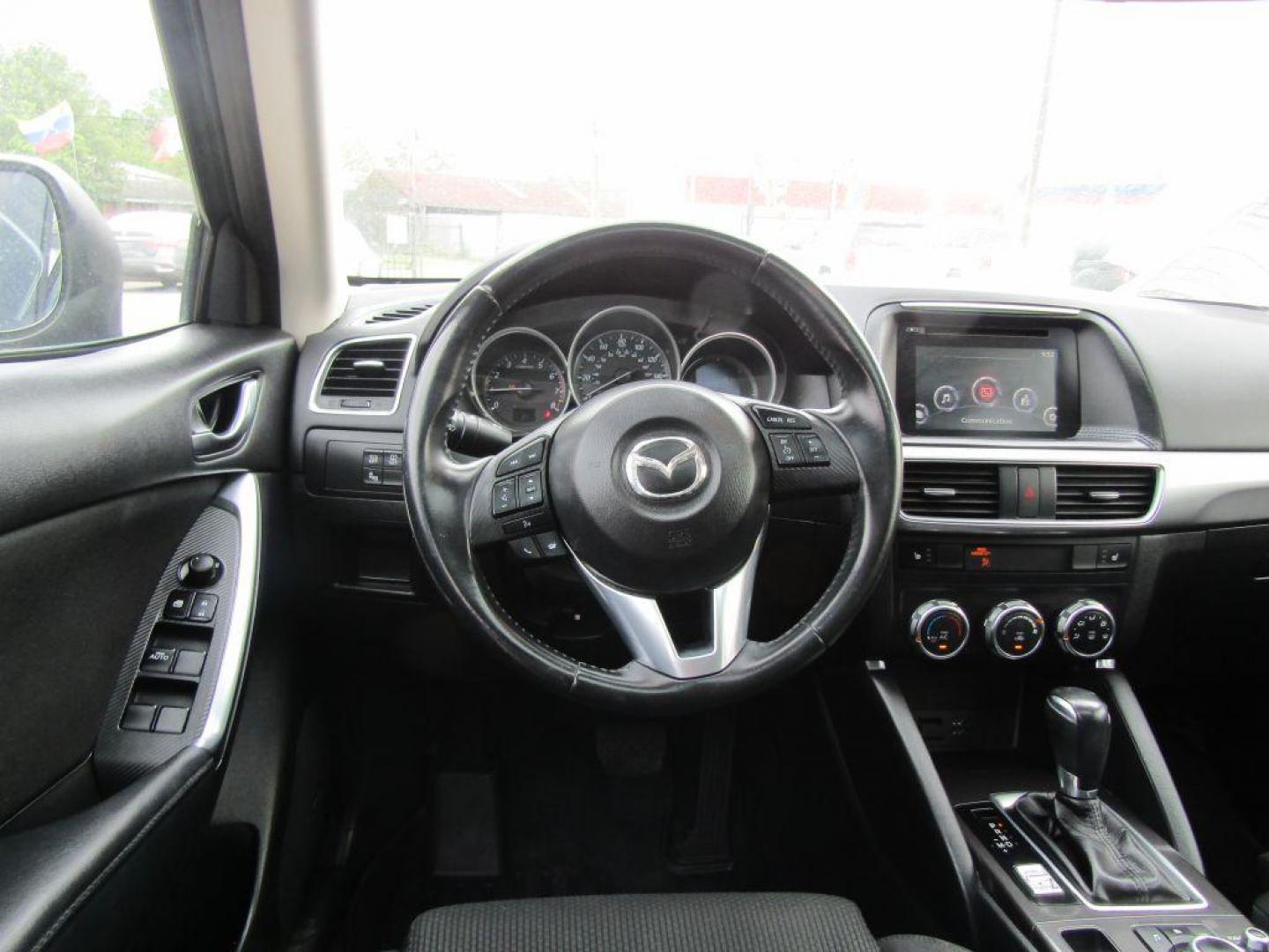 2016 BLUE MAZDA CX-5 TOURING (JM3KE2CY9G0) with an 2.5L engine, Automatic transmission, located at 830 E. Canino Rd., Houston, TX, 77037, (281) 405-0440, 38.358219, -81.729942 - Photo#9