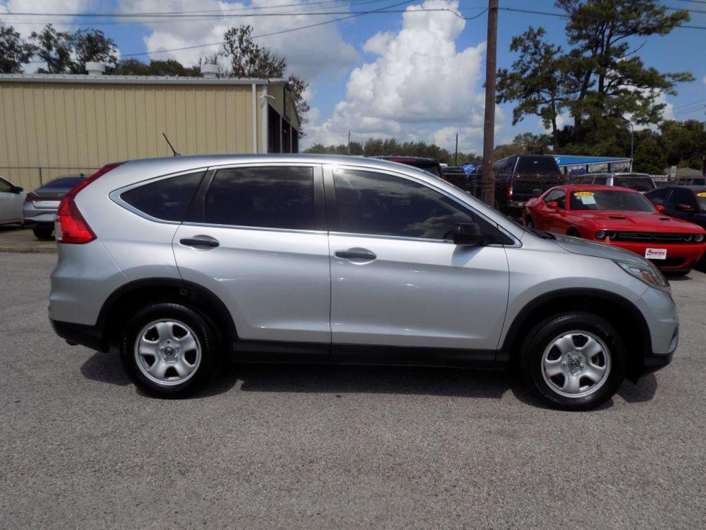 2016 SILVER HONDA CR-V LX (3CZRM3H38GG) with an 2.4L engine, Continuously Variable transmission, located at 830 E. Canino Rd., Houston, TX, 77037, (281) 405-0440, 38.358219, -81.729942 - Photo#1