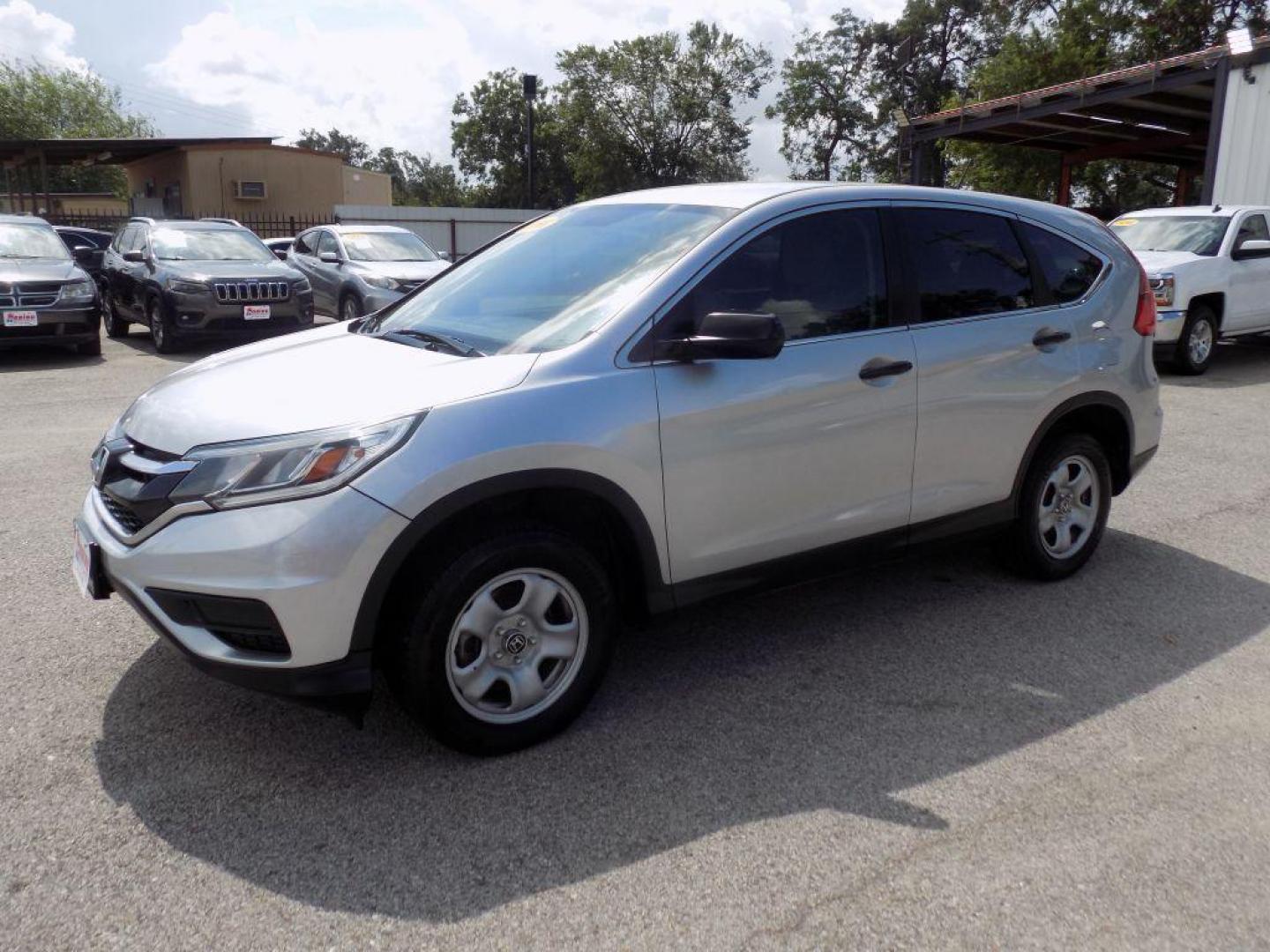 2016 SILVER HONDA CR-V LX (3CZRM3H38GG) with an 2.4L engine, Continuously Variable transmission, located at 830 E. Canino Rd., Houston, TX, 77037, (281) 405-0440, 38.358219, -81.729942 - Photo#5