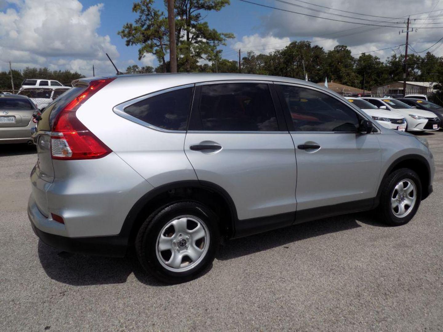 2016 SILVER HONDA CR-V LX (3CZRM3H38GG) with an 2.4L engine, Continuously Variable transmission, located at 830 E. Canino Rd., Houston, TX, 77037, (281) 405-0440, 38.358219, -81.729942 - Photo#7