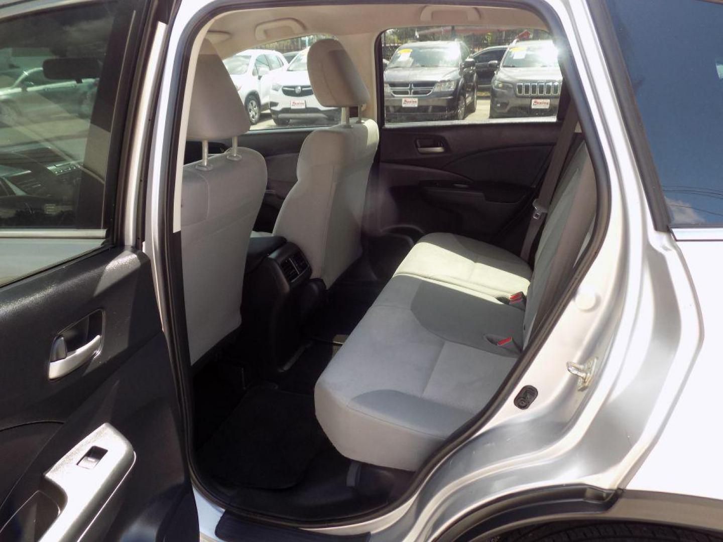 2016 SILVER HONDA CR-V LX (3CZRM3H38GG) with an 2.4L engine, Continuously Variable transmission, located at 830 E. Canino Rd., Houston, TX, 77037, (281) 405-0440, 38.358219, -81.729942 - Photo#13