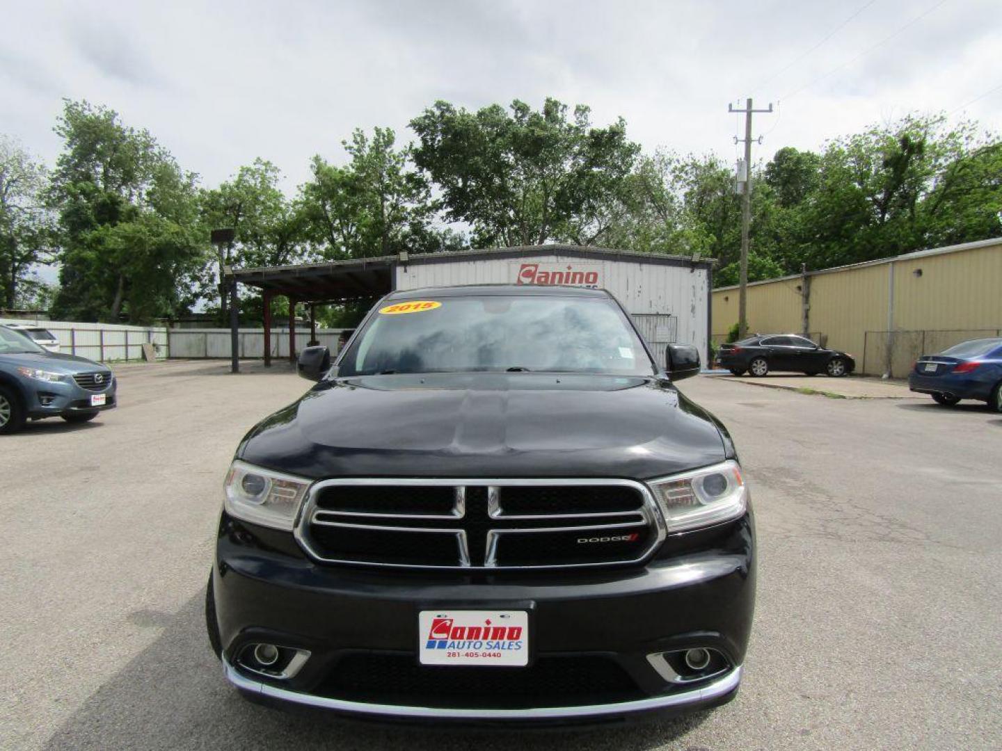 2015 BLACK DODGE DURANGO SXT (1C4RDHAG2FC) with an 3.6L engine, Automatic transmission, located at 830 E. Canino Rd., Houston, TX, 77037, (281) 405-0440, 38.358219, -81.729942 - Photo#0