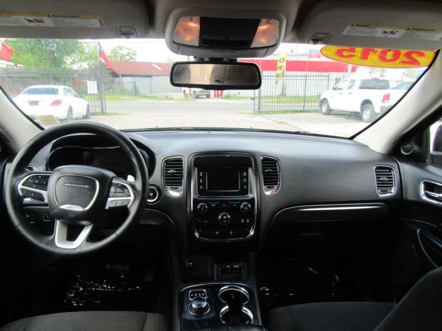 2015 BLACK DODGE DURANGO SXT (1C4RDHAG2FC) with an 3.6L engine, Automatic transmission, located at 830 E. Canino Rd., Houston, TX, 77037, (281) 405-0440, 38.358219, -81.729942 - Photo#18