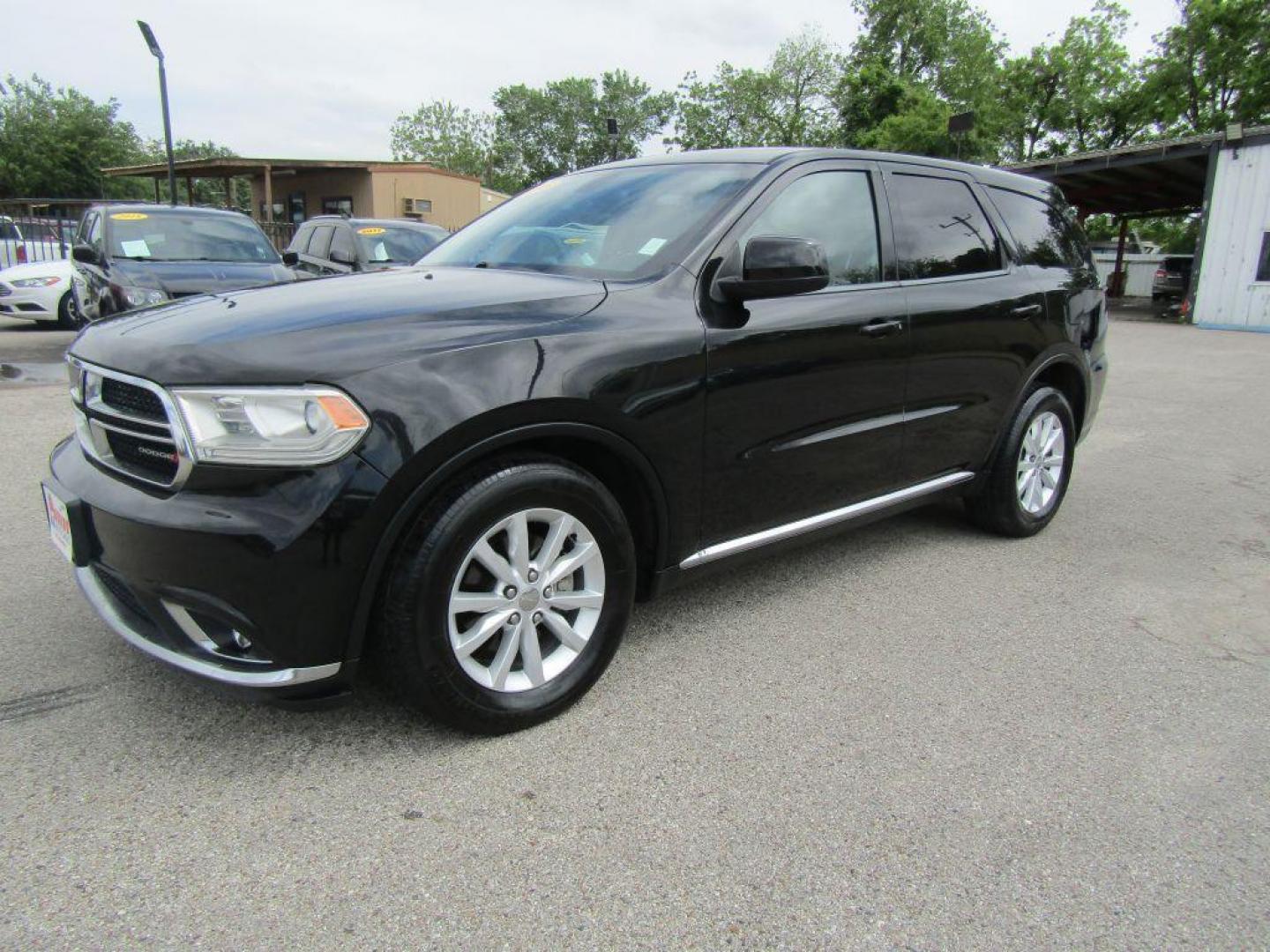 2015 BLACK DODGE DURANGO SXT (1C4RDHAG2FC) with an 3.6L engine, Automatic transmission, located at 830 E. Canino Rd., Houston, TX, 77037, (281) 405-0440, 38.358219, -81.729942 - Photo#1