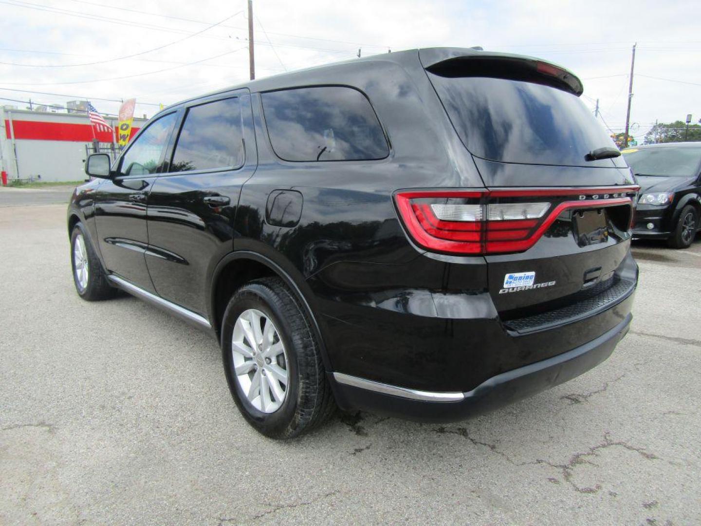 2015 BLACK DODGE DURANGO SXT (1C4RDHAG2FC) with an 3.6L engine, Automatic transmission, located at 830 E. Canino Rd., Houston, TX, 77037, (281) 405-0440, 38.358219, -81.729942 - Photo#2