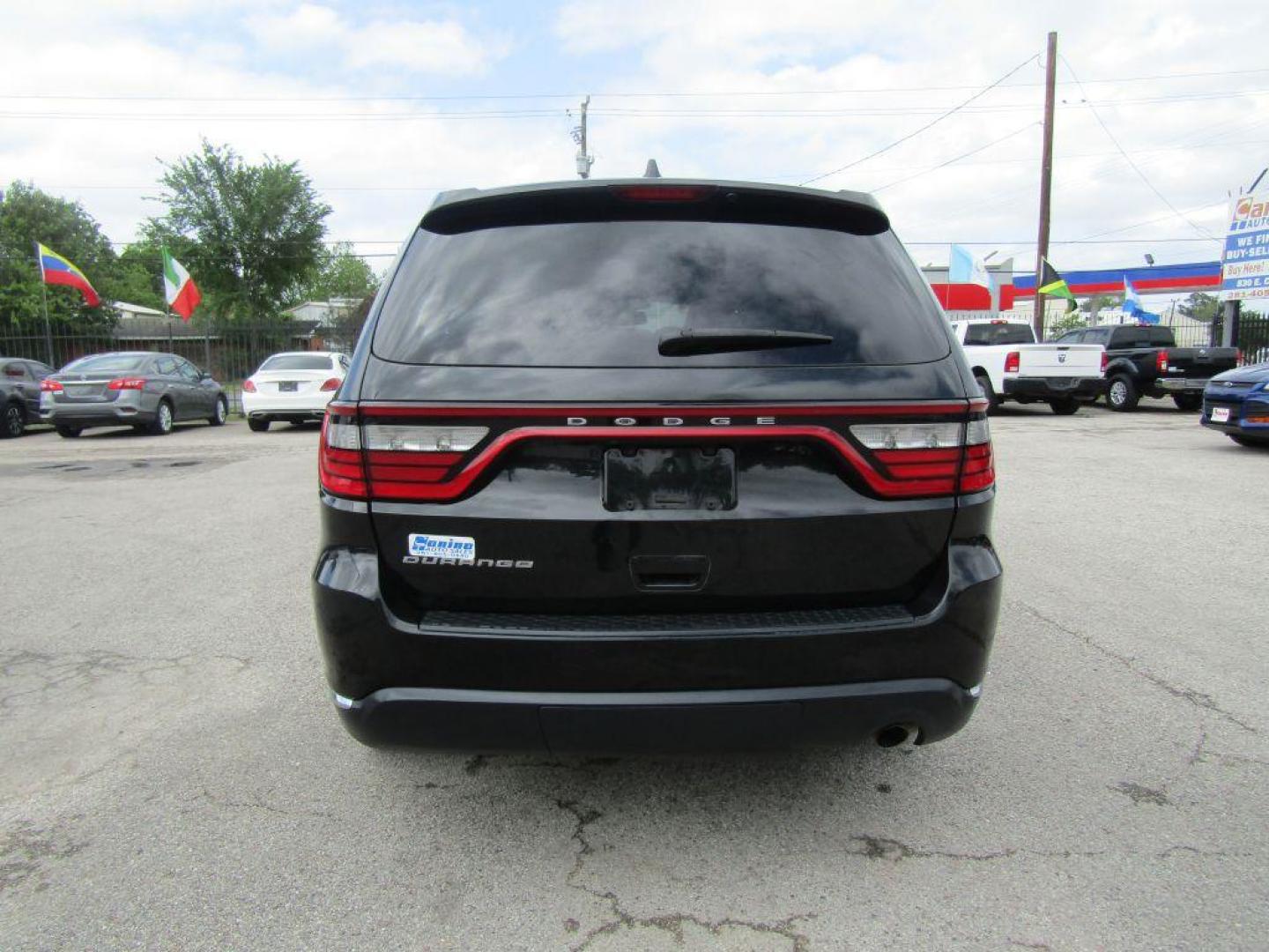 2015 BLACK DODGE DURANGO SXT (1C4RDHAG2FC) with an 3.6L engine, Automatic transmission, located at 830 E. Canino Rd., Houston, TX, 77037, (281) 405-0440, 38.358219, -81.729942 - Photo#3