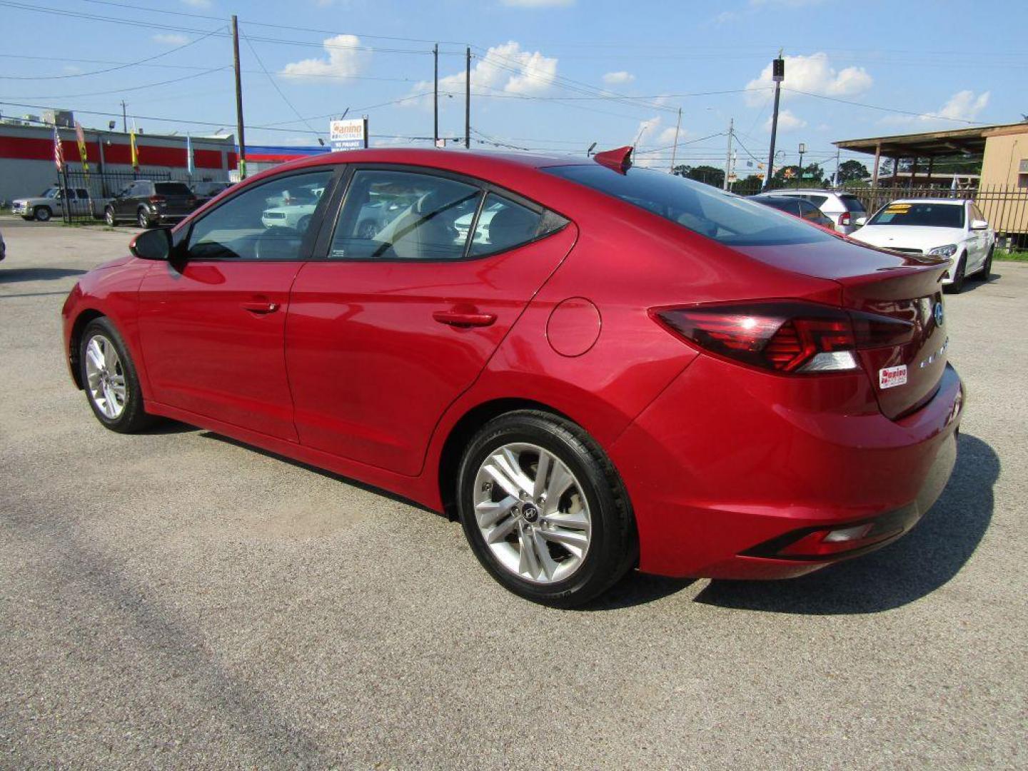 2019 RED HYUNDAI ELANTRA SEL (KMHD84LF0KU) with an 2.0L engine, Automatic transmission, located at 830 E. Canino Rd., Houston, TX, 77037, (281) 405-0440, 38.358219, -81.729942 - Photo#2