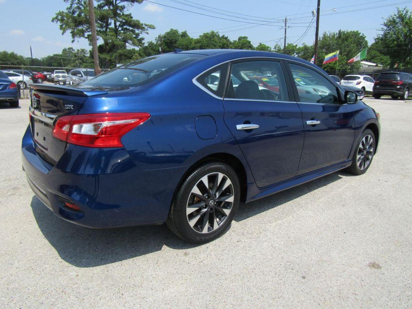 2019 BLUE NISSAN SENTRA S (3N1AB7AP1KY) with an 1.8L engine, Continuously Variable transmission, located at 830 E. Canino Rd., Houston, TX, 77037, (281) 405-0440, 38.358219, -81.729942 - Photo#2