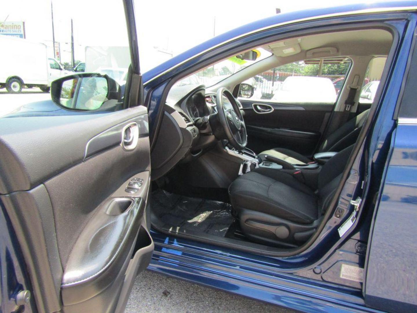 2019 BLUE NISSAN SENTRA S (3N1AB7AP1KY) with an 1.8L engine, Continuously Variable transmission, located at 830 E. Canino Rd., Houston, TX, 77037, (281) 405-0440, 38.358219, -81.729942 - Photo#6