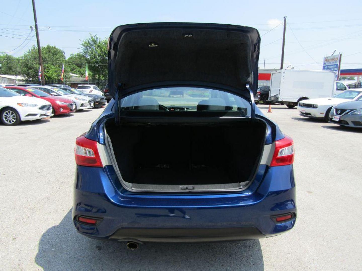 2019 BLUE NISSAN SENTRA S (3N1AB7AP1KY) with an 1.8L engine, Continuously Variable transmission, located at 830 E. Canino Rd., Houston, TX, 77037, (281) 405-0440, 38.358219, -81.729942 - Photo#8