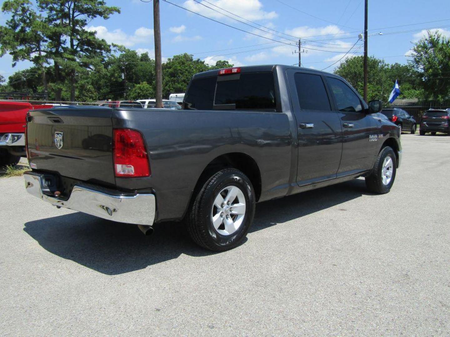 2017 GRAY RAM 1500 SLT (1C6RR6TT7HS) with an 5.7L engine, Automatic transmission, located at 830 E. Canino Rd., Houston, TX, 77037, (281) 405-0440, 38.358219, -81.729942 - Photo#4