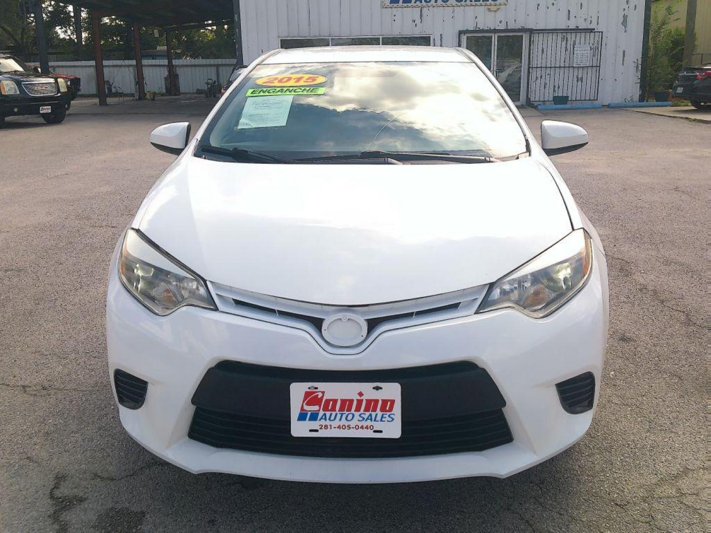 2015 WHITE TOYOTA COROLLA L (5YFBURHE7FP) with an 1.8L engine, Automatic transmission, located at 830 E. Canino Rd., Houston, TX, 77037, (281) 405-0440, 38.358219, -81.729942 - Photo#0