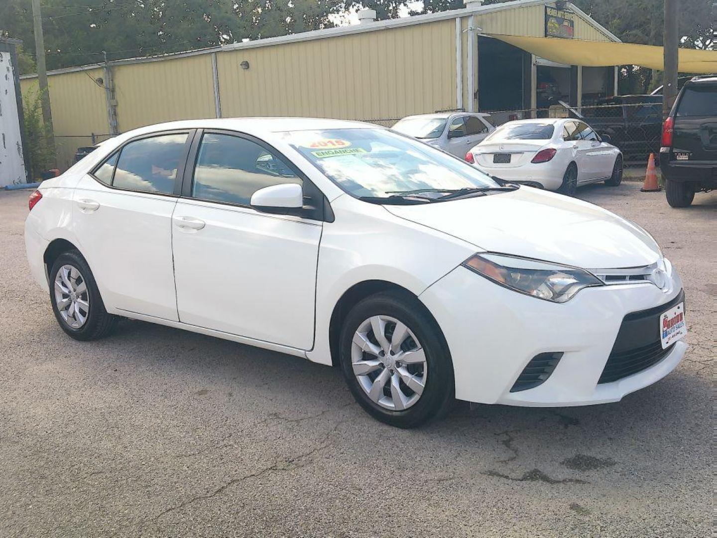 2015 WHITE TOYOTA COROLLA L (5YFBURHE7FP) with an 1.8L engine, Automatic transmission, located at 830 E. Canino Rd., Houston, TX, 77037, (281) 405-0440, 38.358219, -81.729942 - Photo#1